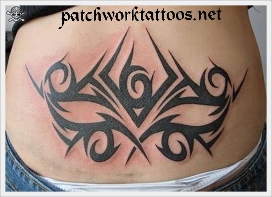 lower back patchwork tattoo