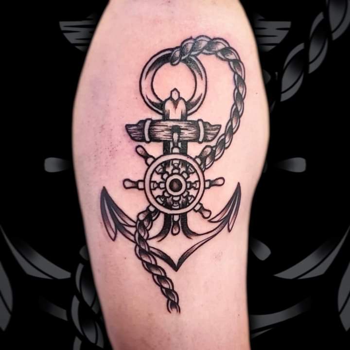 upper arm patchwork tattoo