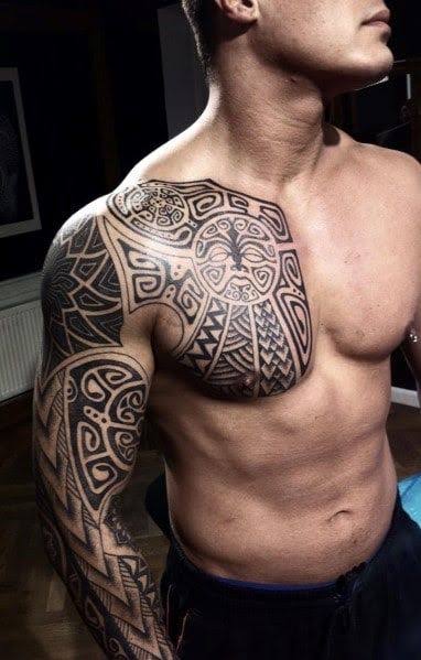 chest and shoulder patchwork tattoo