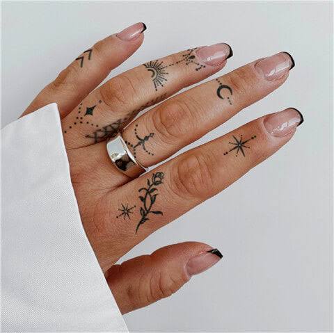 finger patchwork tattoo